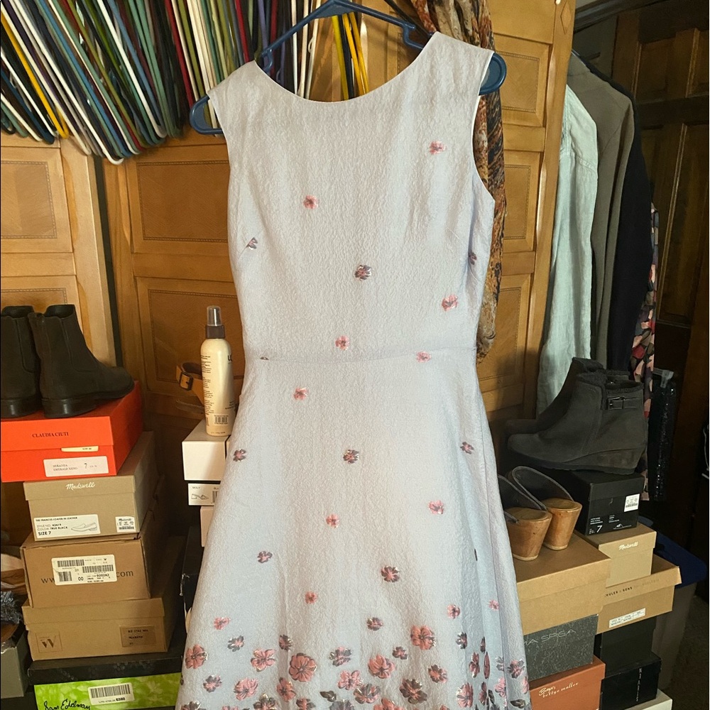 NWOT. Lovely BHLDN dress in pale blue with classic embellishment at hem.